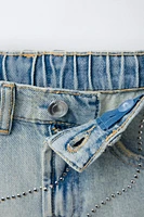SHORT EN DENIM DÉCHIRÉ ET BRILLANT