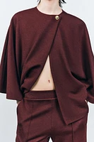 BUTTON CAPE