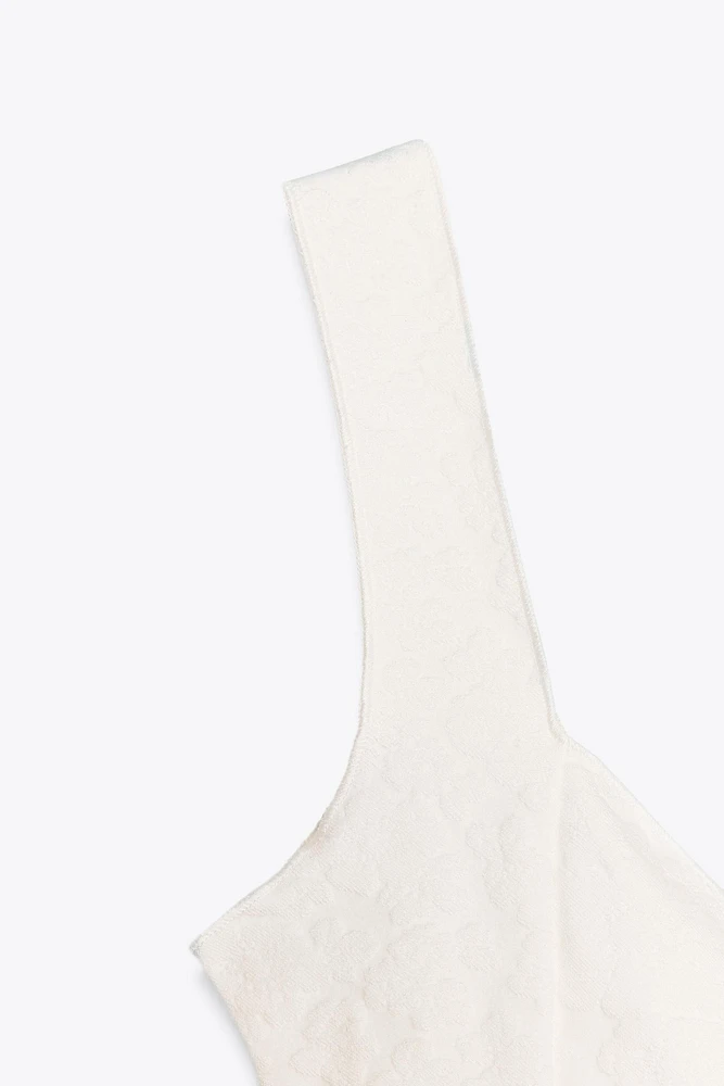 STRETCH JACQUARD PEPLUM TOP