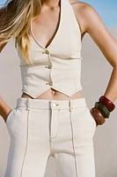 TOP HALTER SURPIQUÉ