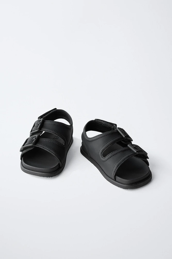 BUCKLED SANDALS