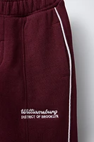 STRAIGHT PLUSH TEXT PANTS