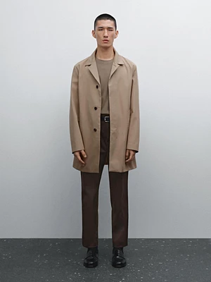 Pantalon tapered élastique sur le côté
