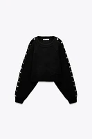 BOBBLE SLEEVE KNIT SWEATER