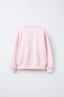 BOW PRINT SWEATSHIRT