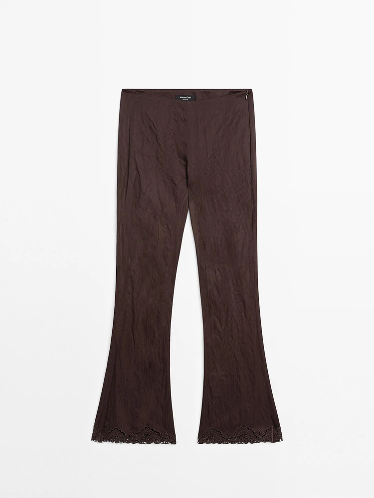 Capri trousers with blonde lace detail