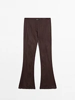 Capri trousers with blonde lace detail