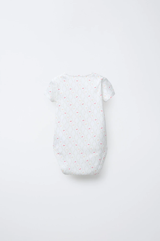 FIVE-PACK OF EMBROIDERED FLORAL BODYSUITS