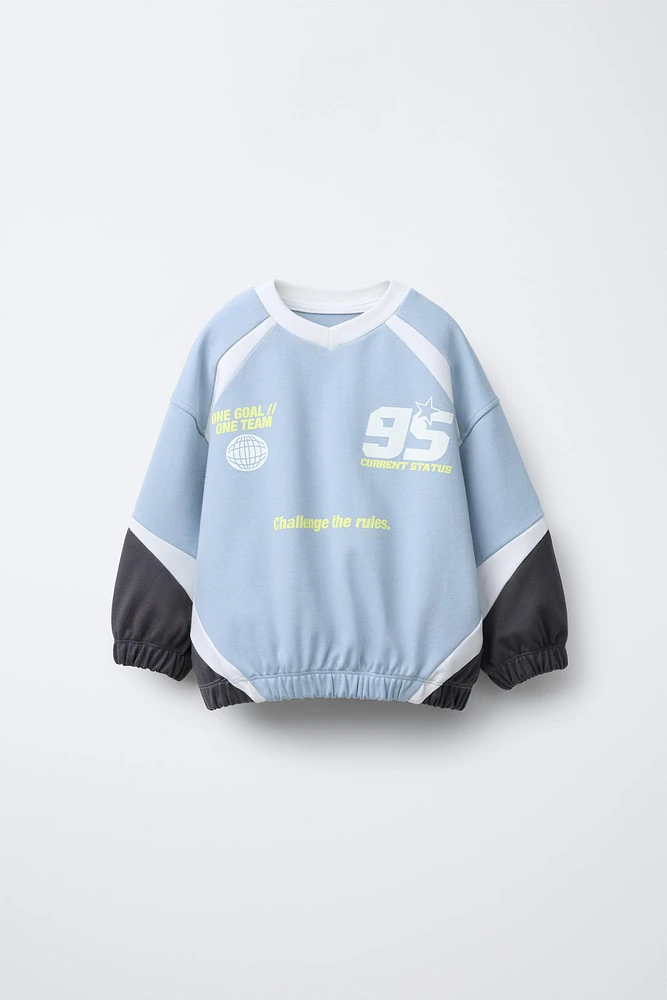 SWEAT À PANNEAUX AVEC INSCRIPTION