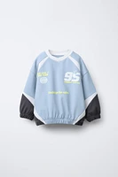 SWEAT À PANNEAUX AVEC INSCRIPTION