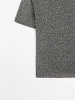Pull en maille métallisée à manches courtes