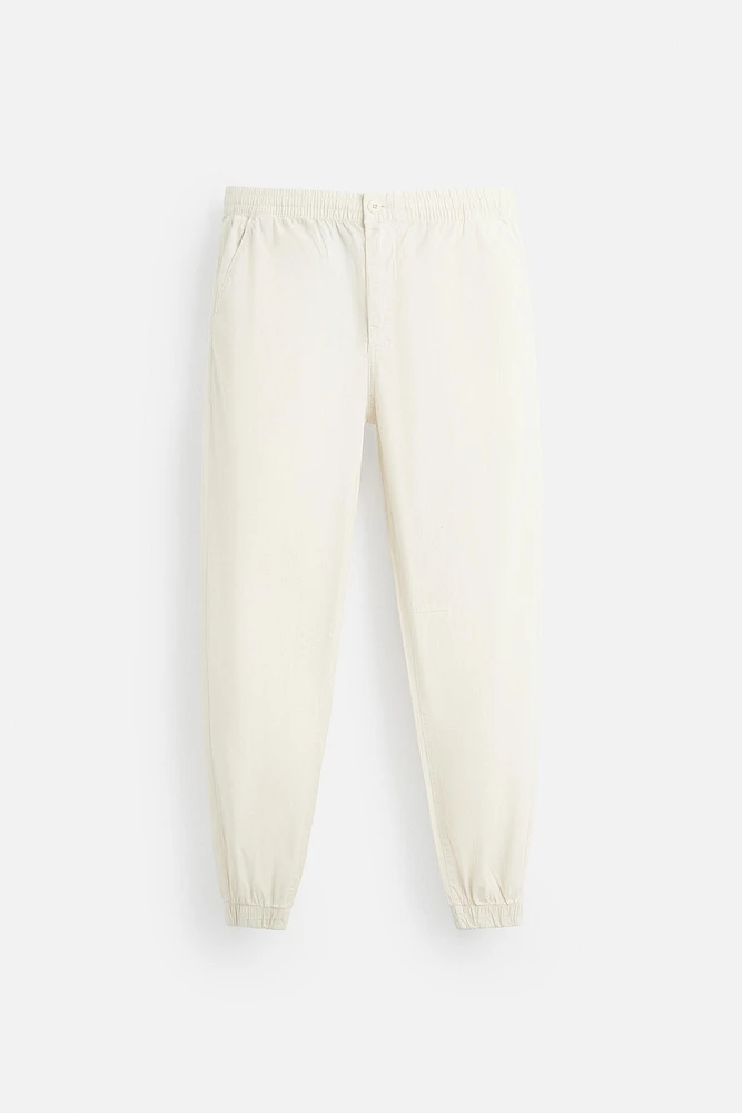 PANTALON DÉLAVÉ AVEC TAILLE JOGGING