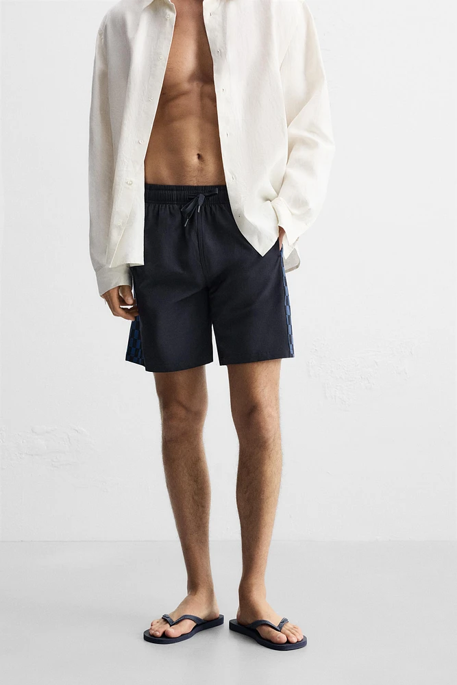MAILLOT DE BAIN LONG À BANDES CARREAUX