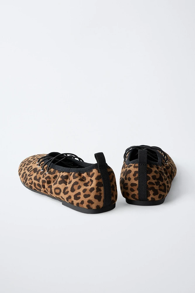 ANIMAL PRINT LACED BALLET FLATS