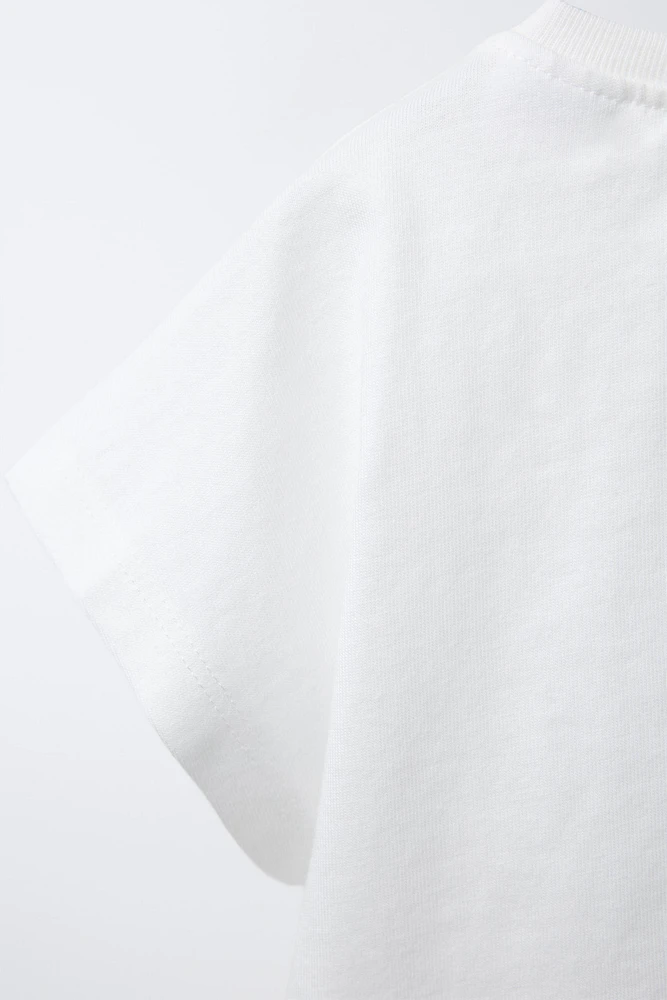 EMBROIDERED TEXT AND BOW T-SHIRT