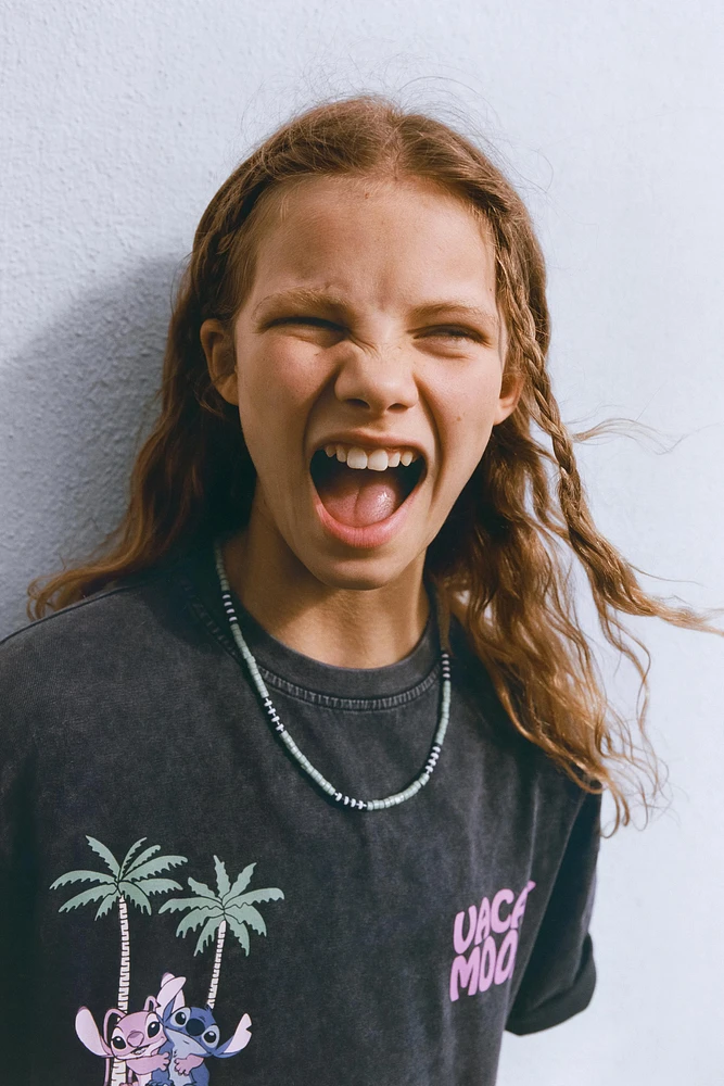 STITCH & ANGEL © DISNEY WASHED-EFFECT T-SHIRT