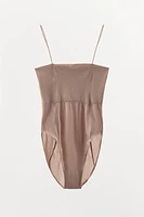 FITTED STRAPPY BODYSUIT WITH SEAMS
