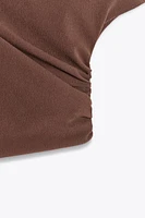 STRUCTURED ASYMMETRICAL CROP TOP