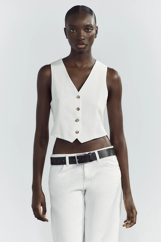 GILET AJOURÉ AU DOS