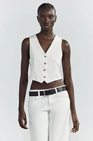 GILET AJOURÉ AU DOS