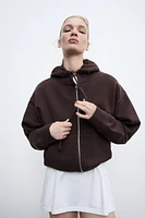 SWEAT ZIPPÉ EFFET DÉLAVÉ