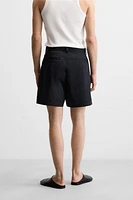 PLEATED BELT BERMUDA SHORTS