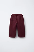 STRAIGHT PLUSH TEXT PANTS