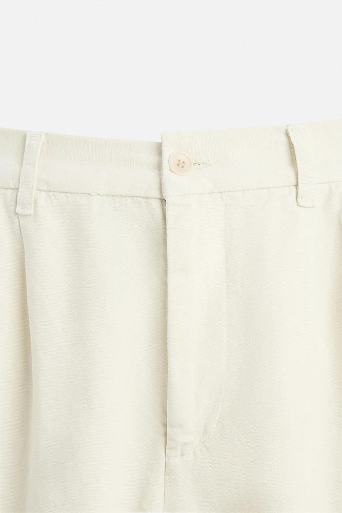 RELAXED FIT PLEATED PANTS