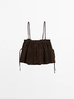 Gathered suede leather top with straps