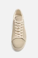 BASKETS EN CUIR