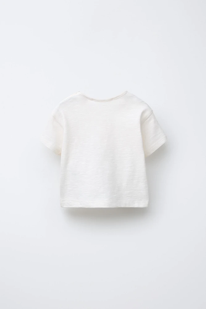 T-SHIRT À PIÈCE TOMATE