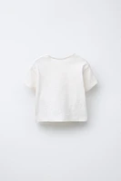 T-SHIRT À PIÈCE TOMATE