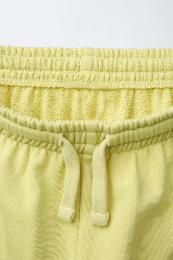 PLUSH SHORTS WITH TEXT