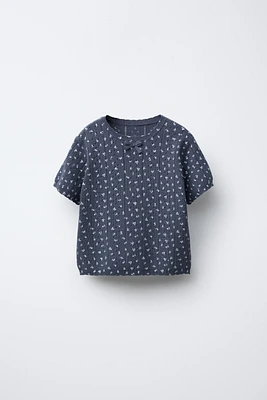 TOP EN MAILLE POINTELLE