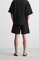 WRINKLED EFFECT JACQUARD BERMUDA SHORTS