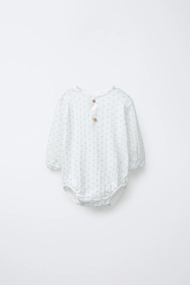 PRINTED BODYSUIT