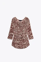 COMBINATION KNIT PEPLUM SWEATER