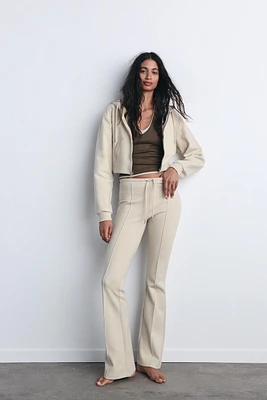 FLARE INTERLOCK PANTS WITH SEAMS