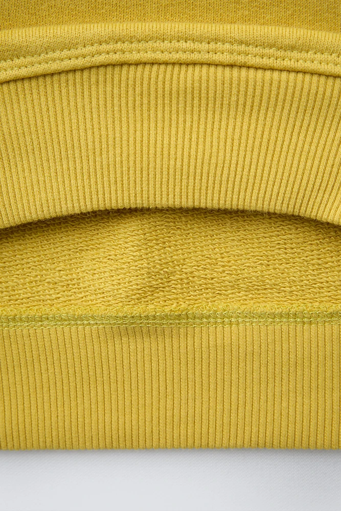PATCH PRINT SWEATSHIRT