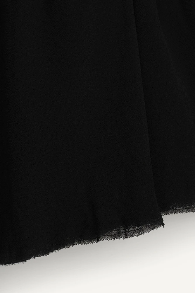 LIMITED EDITION COMBINATION SHORT SKIRT