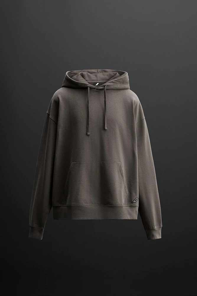 SWEAT À CAPUCHE