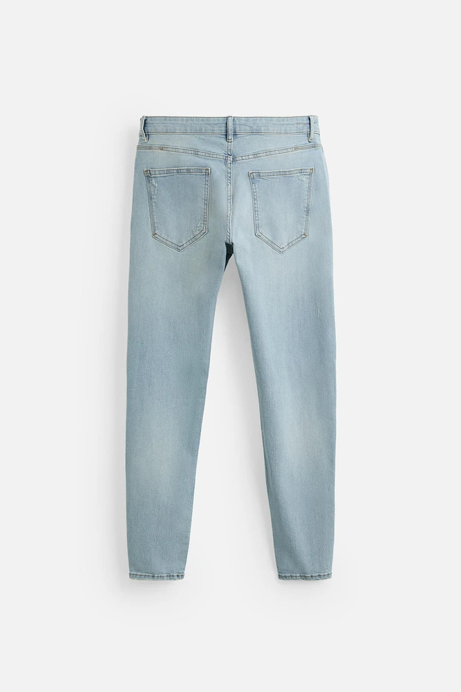 RIPPED SKINNY JEANS