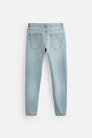RIPPED SKINNY JEANS