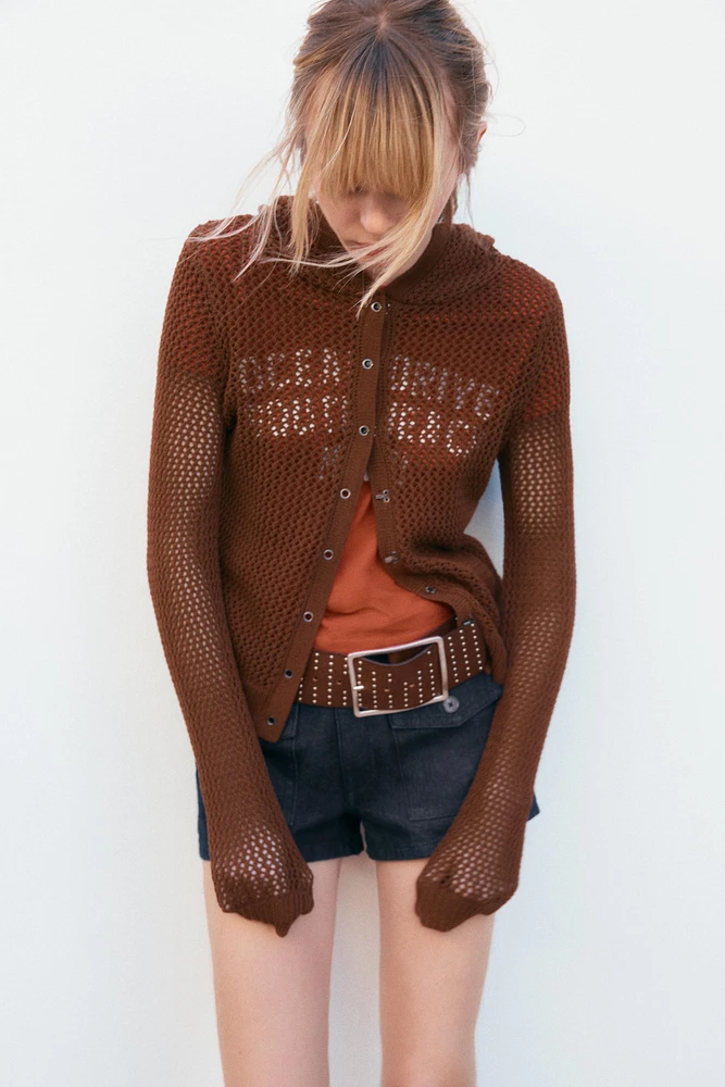 GILET EN MAILLE À CAPUCHE