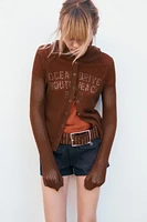 GILET EN MAILLE À CAPUCHE