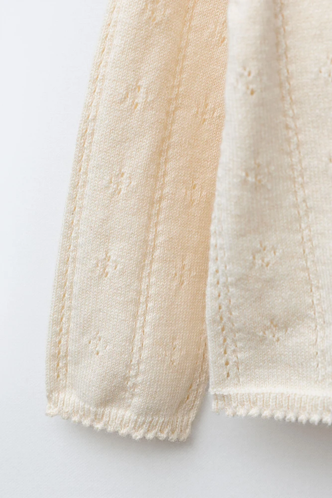 GILET EN MAILLE AJOURÉE ET BRODÉE