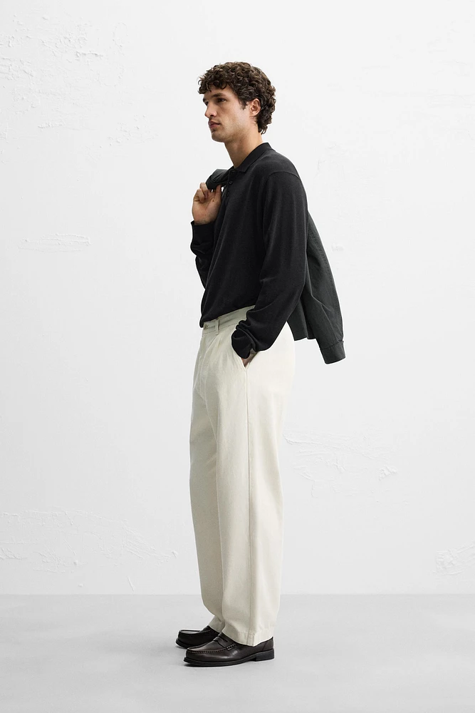 RELAXED FIT PLEATED PANTS