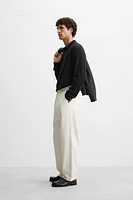 RELAXED FIT PLEATED PANTS