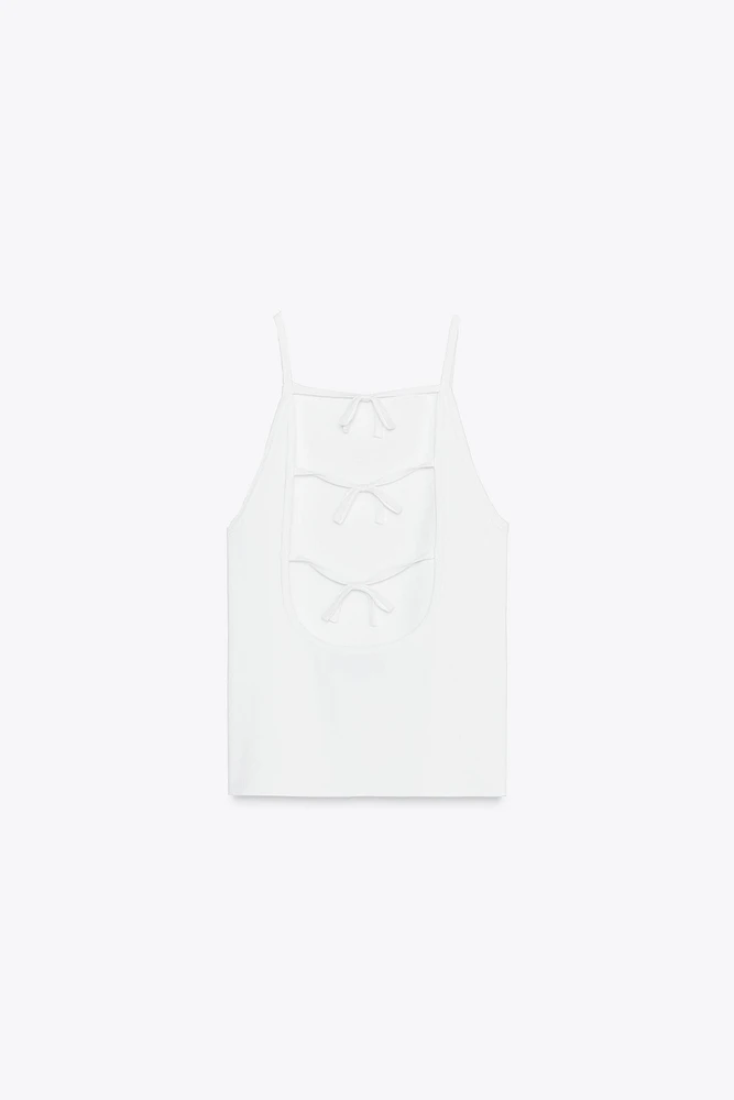 TOP EN MAILLE AJOURÉ AVEC LACETS