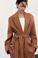 VESTE OVERSIZE À CEINTURE